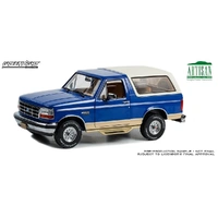 Greenlight 1/18 1996 Ford Bronco Eddie Bauer Edition Royal Blue  Metallic and Tucson Bronze Artisan Collection