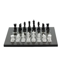 Dal Rossi Italy Chess Set with Diamond-Cut Black & White 85mm chessmen on a Carbon Fibre Shiny Finish Chess Board16"